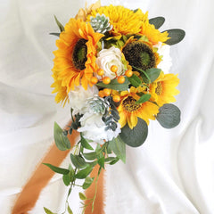 European style simulated sunflower bouquet with water drops in hand