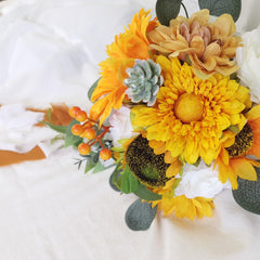 European style simulated sunflower bouquet with water drops in hand