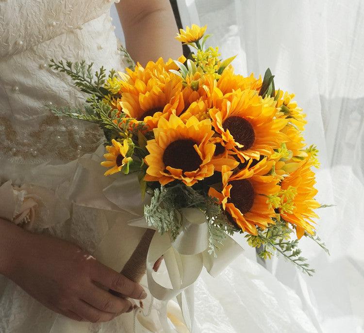 Simulated bride holding flower sunflower bouquet