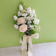 Simulated bride holding flowers wedding arrangement