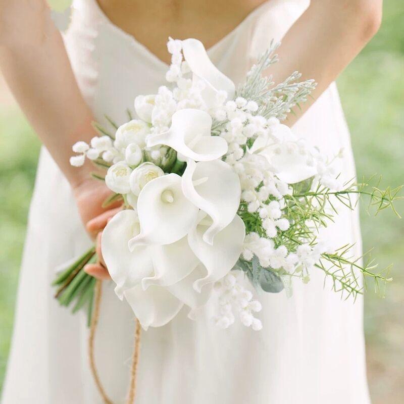 Simulated bride holding flowers wedding arrangement